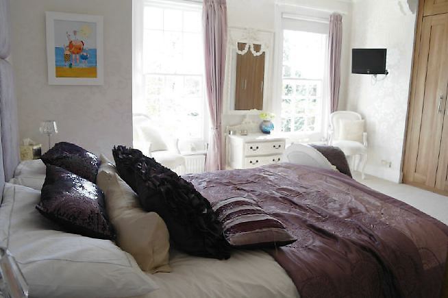 An Edwardian style house renovated with a modern, contemporary style and a large garden.