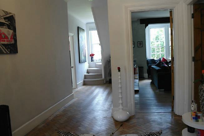 An Edwardian style house renovated with a modern, contemporary style and a large garden.