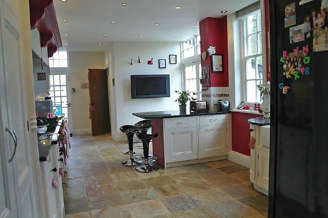 An Edwardian style house renovated with a modern, contemporary style and a large garden.