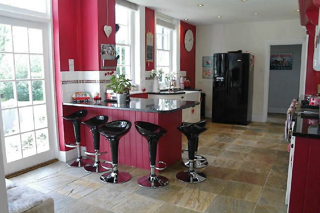 An Edwardian style house renovated with a modern, contemporary style and a large garden.