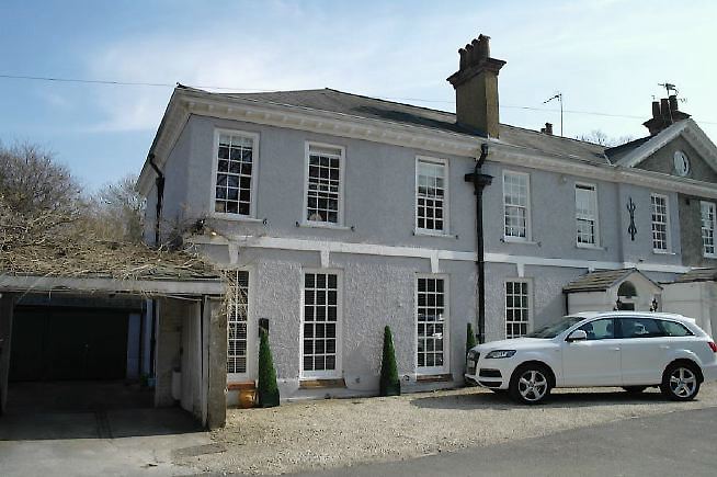 An Edwardian style house renovated with a modern, contemporary style and a large garden.