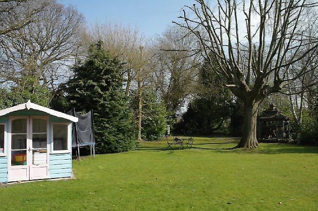 An Edwardian style house renovated with a modern, contemporary style and a large garden.