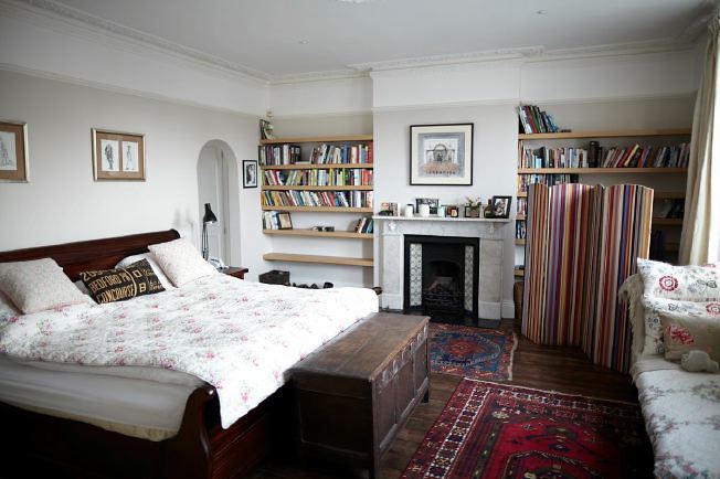 A semi-detached 5 bedroomed house with two reception rooms a conservatory and large back garden.