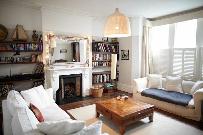 A semi-detached 5 bedroomed house with two reception rooms a conservatory and large back garden.