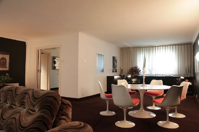L shaped sitting room of amazing, retro house.  All original 70's furniture.