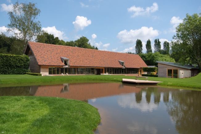 Absolutely stunning contemporary garden of a stylish modern barn conversion