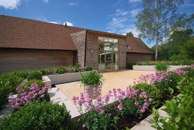 Absolutely stunning contemporary garden of a stylish modern barn conversion