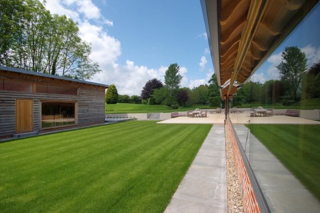 Absolutely stunning contemporary garden of a stylish modern barn conversion
