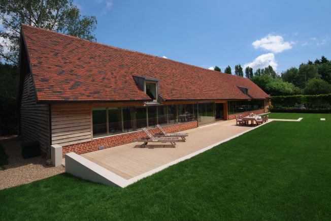 Absolutely stunning contemporary garden of a stylish modern barn conversion