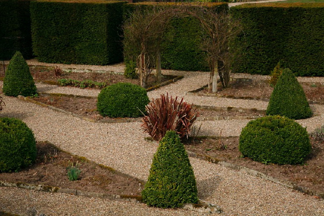 Large formal gardens, outbuildings and woodland at an amazingly eclectic country house.