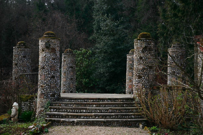 Large formal gardens, outbuildings and woodland at an amazingly eclectic country house.