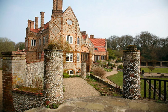Large formal gardens, outbuildings and woodland at an amazingly eclectic country house.