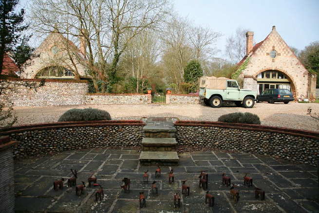 Large formal gardens, outbuildings and woodland at an amazingly eclectic country house.