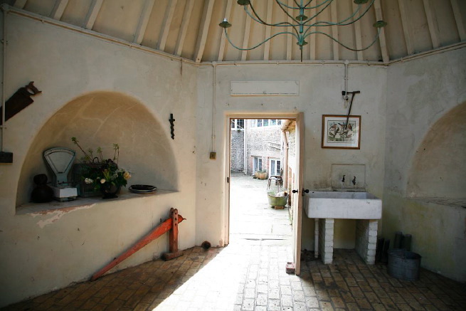 Large formal gardens, outbuildings and woodland at an amazingly eclectic country house.
