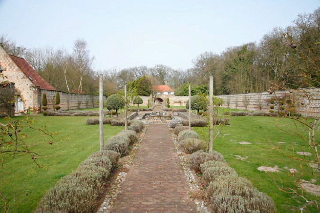 Large formal gardens, outbuildings and woodland at an amazingly eclectic country house.