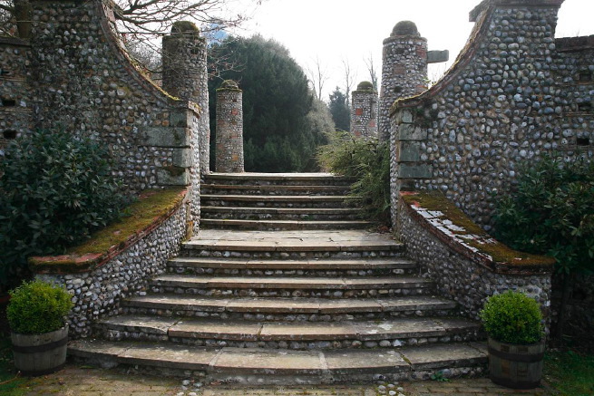 Large formal gardens, outbuildings and woodland at an amazingly eclectic country house.