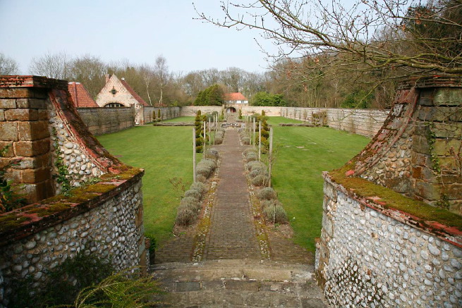 Large formal gardens, outbuildings and woodland at an amazingly eclectic country house.