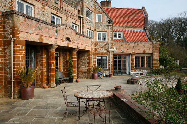 Large formal gardens, outbuildings and woodland at an amazingly eclectic country house.