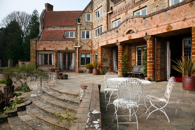 Large formal gardens, outbuildings and woodland at an amazingly eclectic country house.