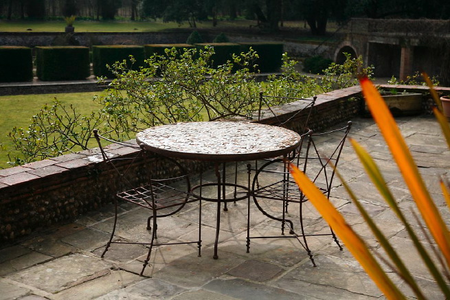 Large formal gardens, outbuildings and woodland at an amazingly eclectic country house.