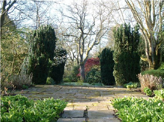 Twenty six acres of woodland garden with greenhouses, thatched folly, 2 ponds, sweeping lawns, large disused flint pit and many colourful plants.