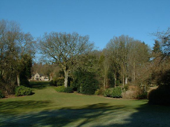 Twenty six acres of woodland garden with greenhouses, thatched folly, 2 ponds, sweeping lawns, large disused flint pit and many colourful plants.