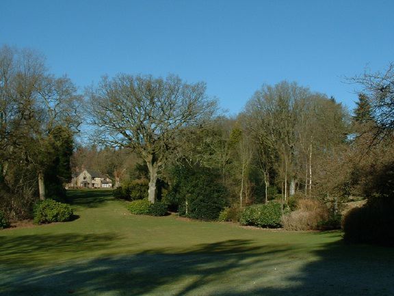 Twenty six acres of woodland garden with greenhouses, thatched folly, 2 ponds, sweeping lawns, large disused flint pit and many colourful plants.