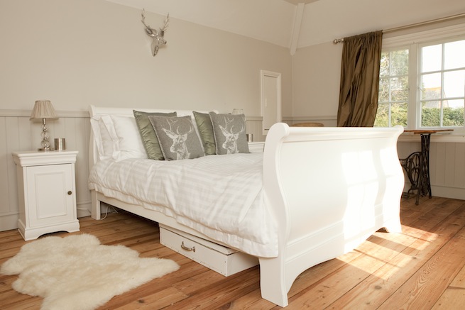 Amazing medieval hall house with beautiful country gardens, featuring vegetable garden and pond.