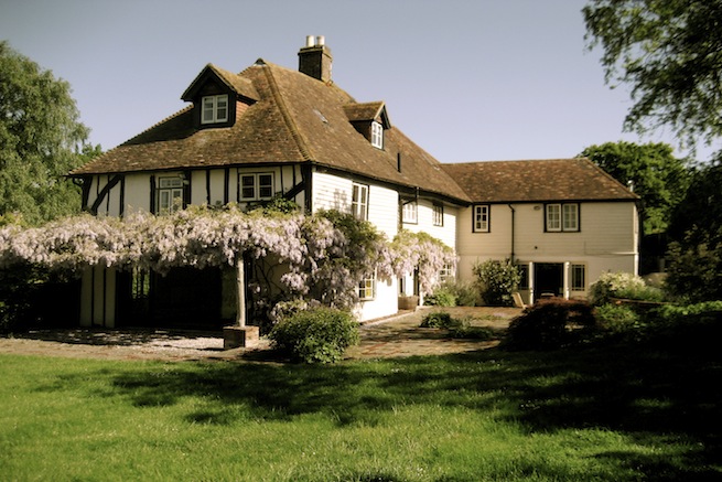 Amazing medieval hall house with beautiful country gardens, featuring vegetable garden and pond.