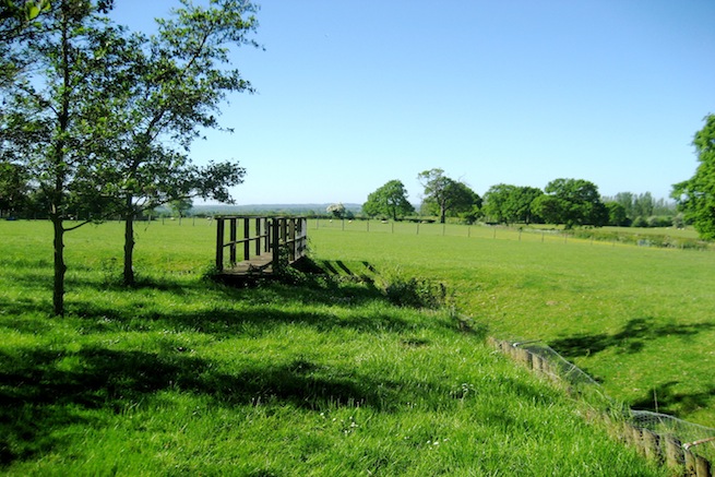 Amazing medieval hall house with beautiful country gardens, featuring vegetable garden and pond.