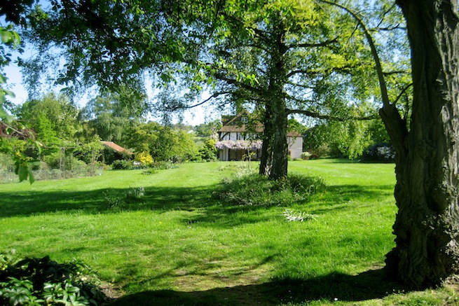 Amazing medieval hall house with beautiful country gardens, featuring vegetable garden and pond.