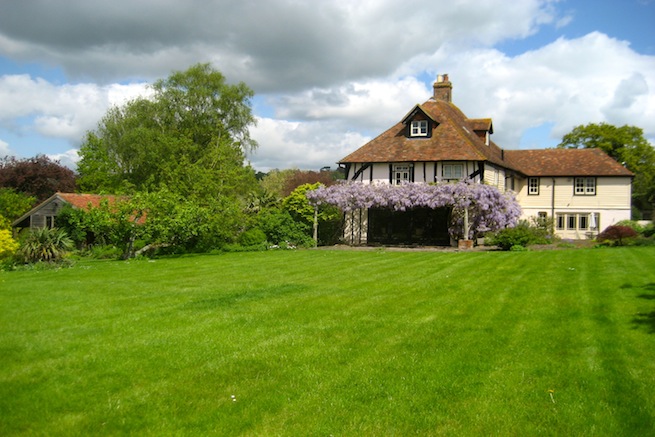 Amazing medieval hall house with beautiful country gardens, featuring vegetable garden and pond.