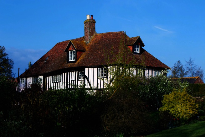 Amazing medieval hall house with beautiful country gardens, featuring vegetable garden and pond.