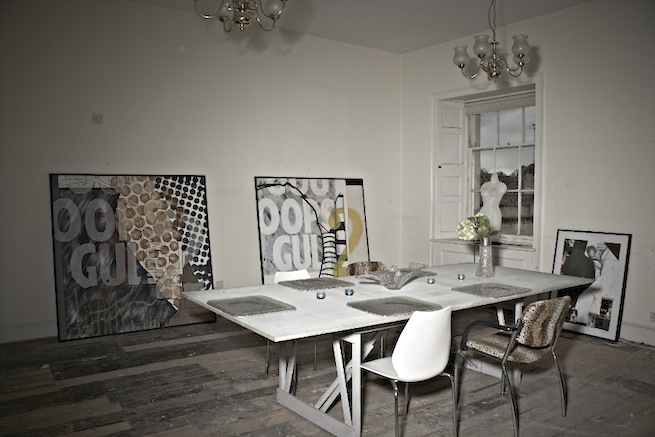 A large 17th century town house in the process of restoration. Some rooms have been done up, each with its own look and some rooms are empty.