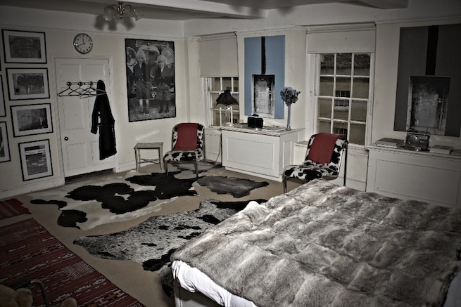 A large 17th century town house in the process of restoration. Some rooms have been done up, each with its own look and some rooms are empty.