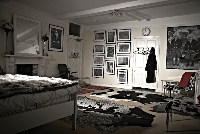 A large 17th century town house in the process of restoration. Some rooms have been done up, each with its own look and some rooms are empty.