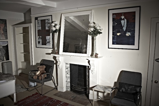 A large 17th century town house in the process of restoration. Some rooms have been done up, each with its own look and some rooms are empty.