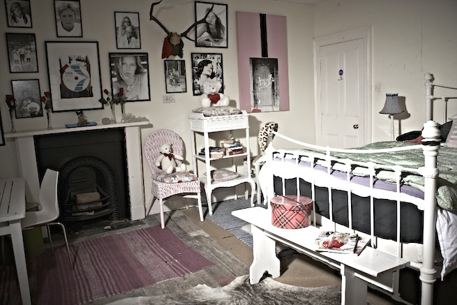 A large 17th century town house in the process of restoration. Some rooms have been done up, each with its own look and some rooms are empty.