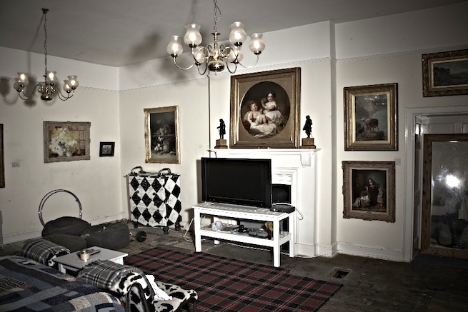 A large 17th century town house in the process of restoration. Some rooms have been done up, each with its own look and some rooms are empty.