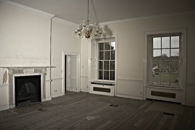 A large 17th century town house in the process of restoration. Some rooms have been done up, each with its own look and some rooms are empty.
