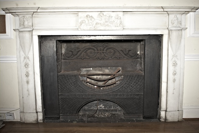 A large 17th century town house in the process of restoration. Some rooms have been done up, each with its own look and some rooms are empty.
