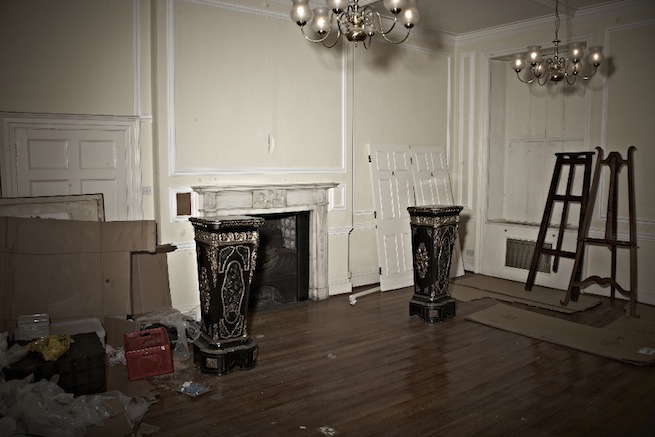 A large 17th century town house in the process of restoration. Some rooms have been done up, each with its own look and some rooms are empty.