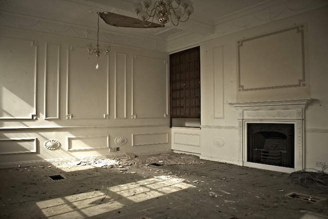 A large 17th century town house in the process of restoration. Some rooms have been done up, each with its own look and some rooms are empty.