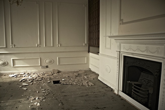 A large 17th century town house in the process of restoration. Some rooms have been done up, each with its own look and some rooms are empty.
