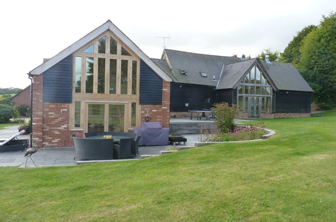 Old Granary Barn dating back to 1756 with modern interior, surrounded by countryside with private paddocks