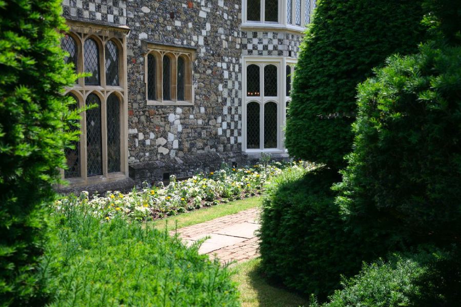 Topiary gardens, rose gardens, formal gardens and parkland around a Medieval Manor House