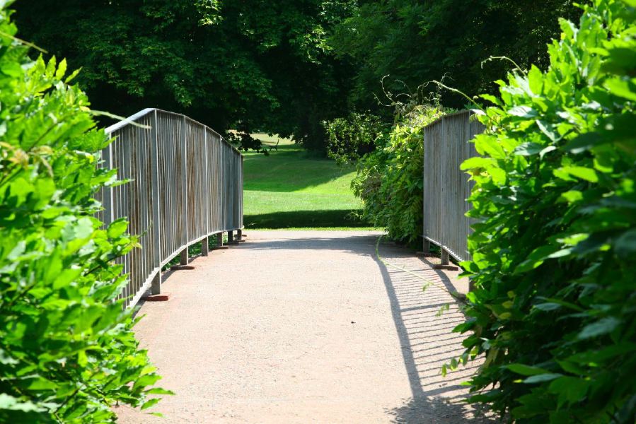 Topiary gardens, rose gardens, formal gardens and parkland around a Medieval Manor House