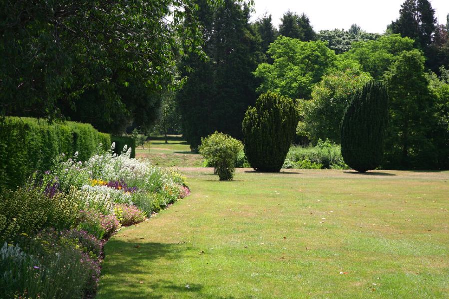 Topiary gardens, rose gardens, formal gardens and parkland around a Medieval Manor House