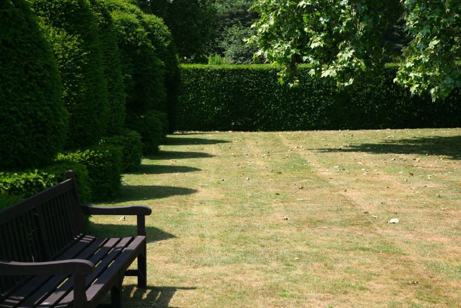 Topiary gardens, rose gardens, formal gardens and parkland around a Medieval Manor House