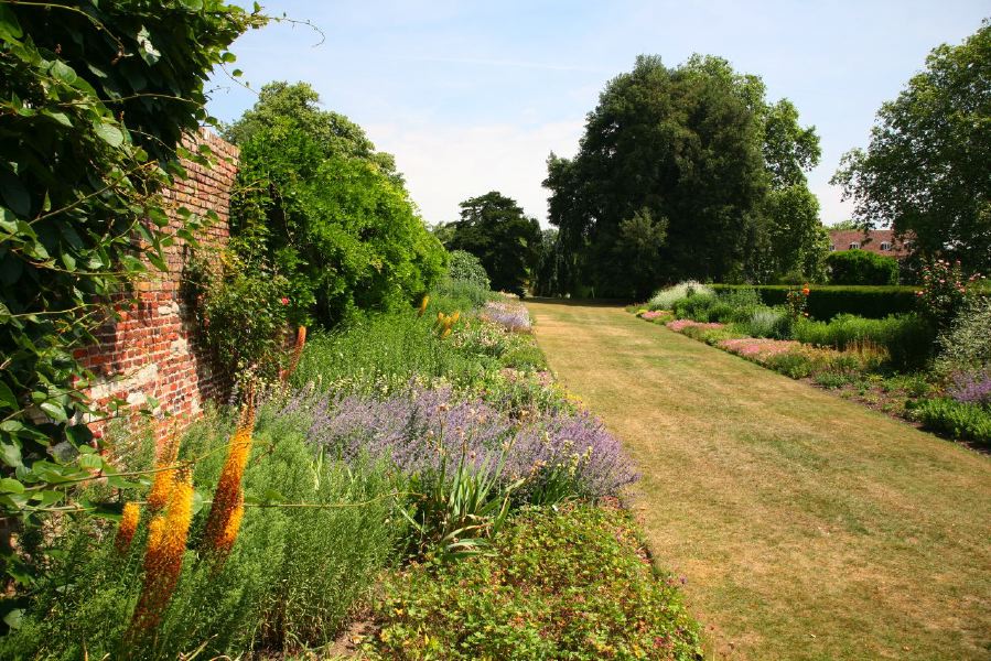Topiary gardens, rose gardens, formal gardens and parkland around a Medieval Manor House